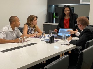 the Chief Marketing Officer attempts to discuss some statistics in a table with the General Manager